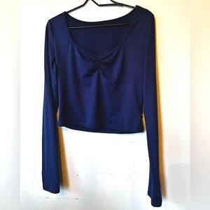 Woman’s blue long sleeve v neck crop top.  Size M​